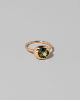 View from the side of the Bicolor Sapphire Grand Level Ring on light color background.