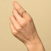 product_details::Gold Solid Round Wire High Peak Band on model.