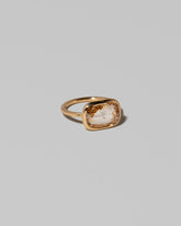 View from the side of the Gusher Diamond Ring 013 on light color background.