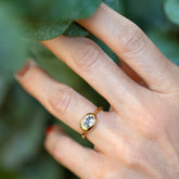 product_details::Oval Sapphire Equalize Ring on model.