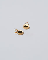 Mini Macaron Charm - 14k Gold on light color background.