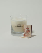 Closeup details of the Ranger Station Santalum Candle with matchbox on light color background.