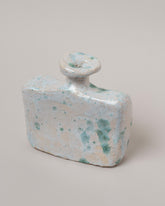 Closeup details of the Willem van Hooff Oxley Tiny Core Vessel on light color background.