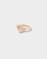 Oneness Ring on light color background.