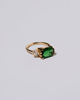 Product photo of the Golden Darura Ring on a light color background