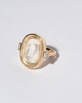 Closeup details of the Passion Intaglio Seal Ring on light color background.