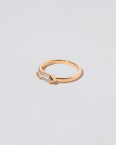 View from the side of the Paradise Ring on light color background.
