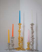 Styled image featuring the POLSPOTTEN Gold Small, Silver Small, Silver Medium, Gold Medium, Silver Large and Gold Large Drip Candle Holders.