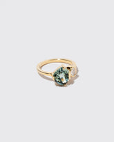 Xanadu Ring on light color background.