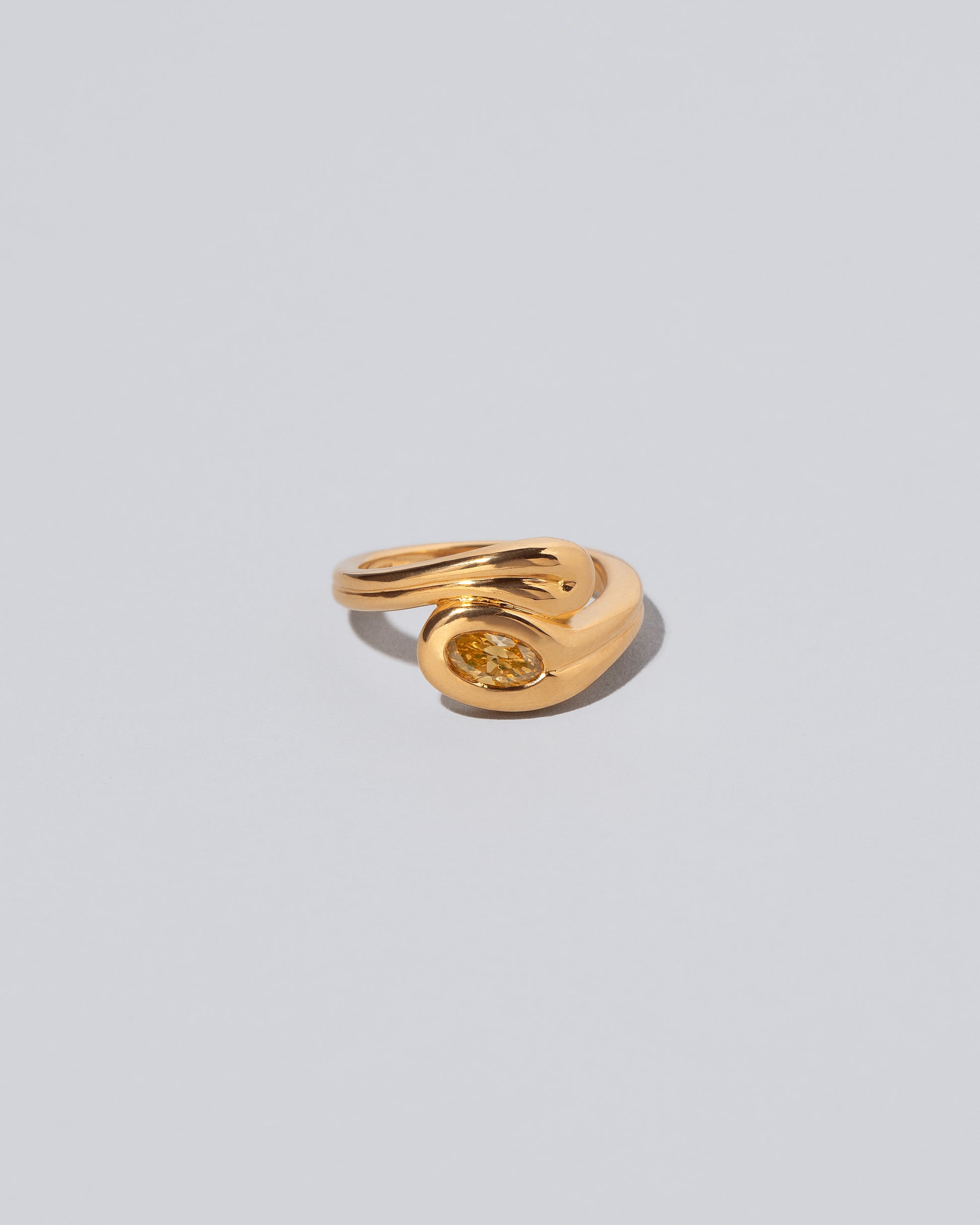Fold It Ring on light color background.