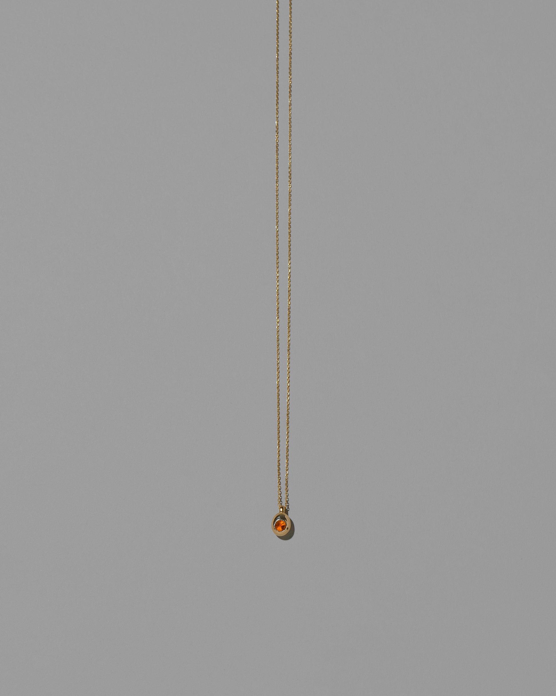 Citrine Birthstone Level Necklace on light color background.