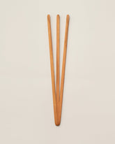 Jonathan's Spoons Pasta Utensil on light color background.