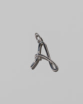 CRZM Large Letter A Charm set in sterling silver on light color background.