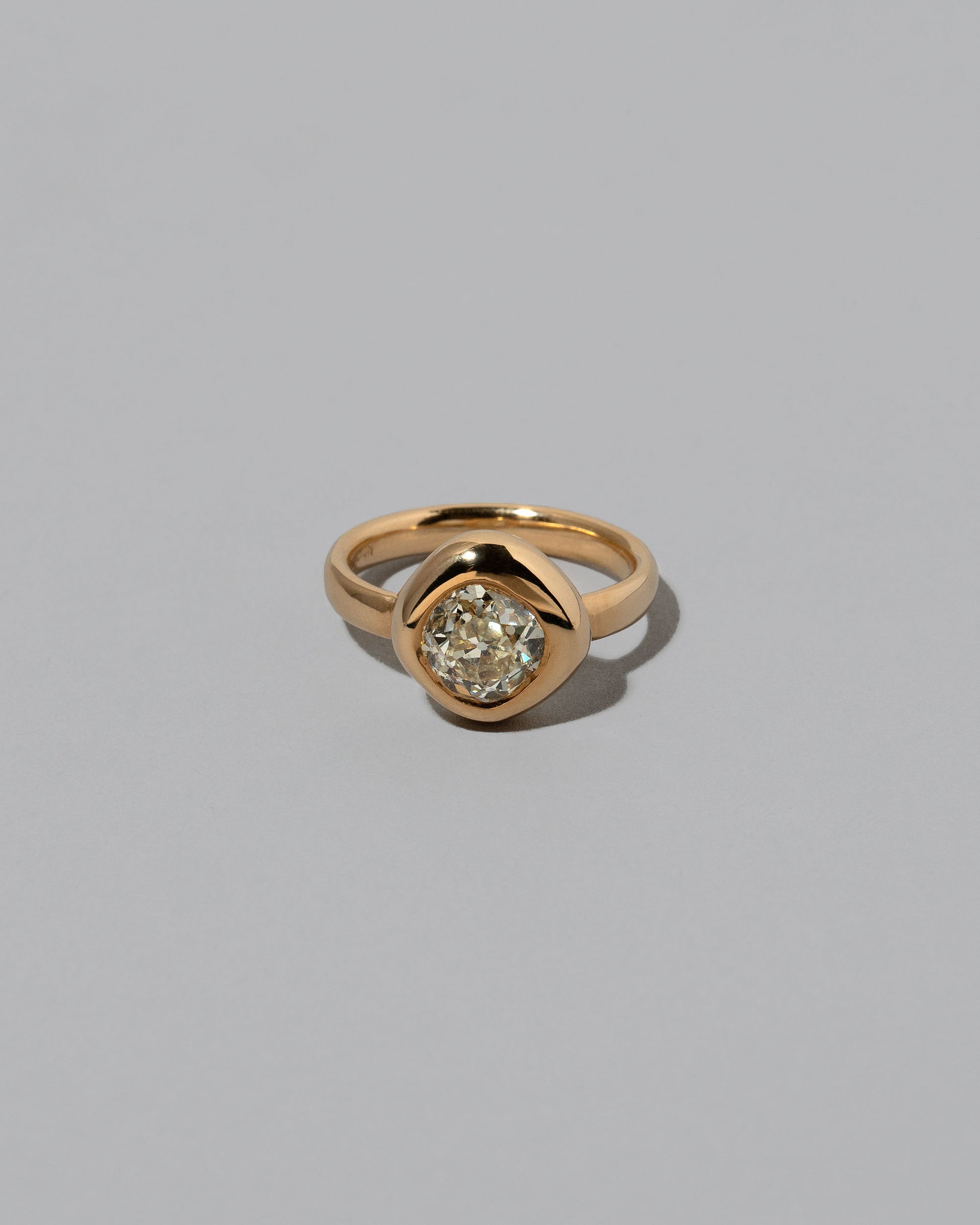 Balanced Ring on light color background.