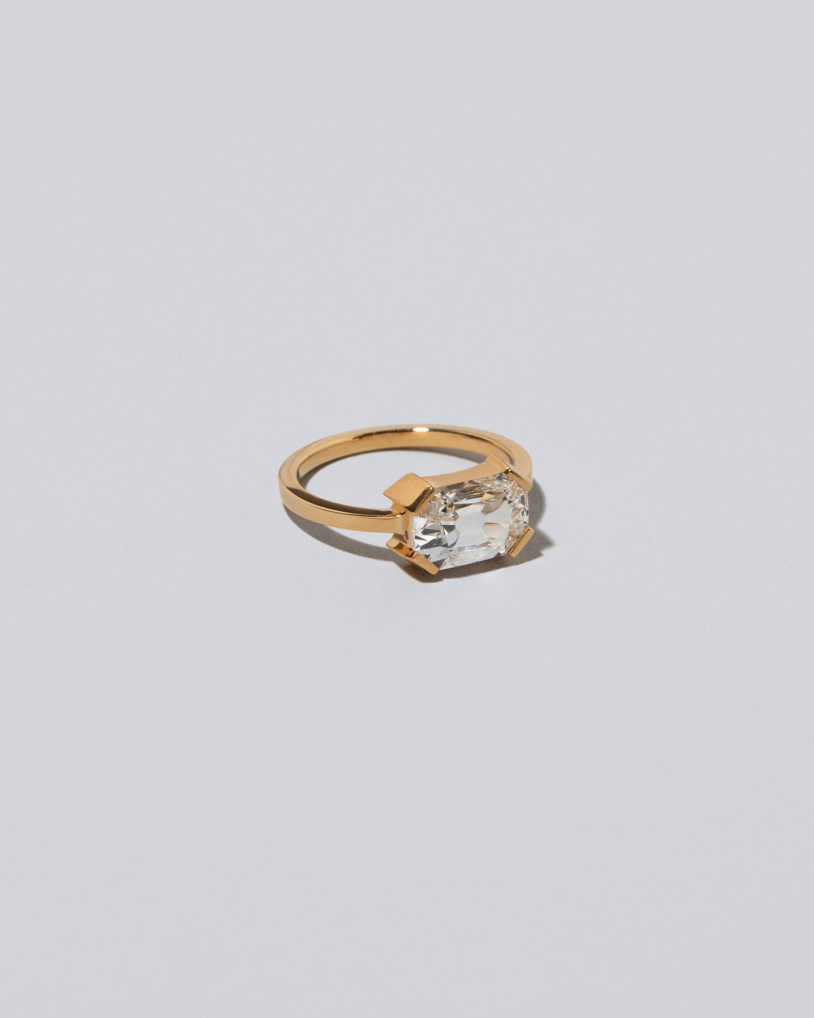 View from the side of the Bright Future Ring on light color background.