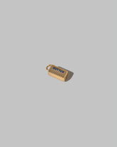 Stick of Salted Butter Charm on light color background.
