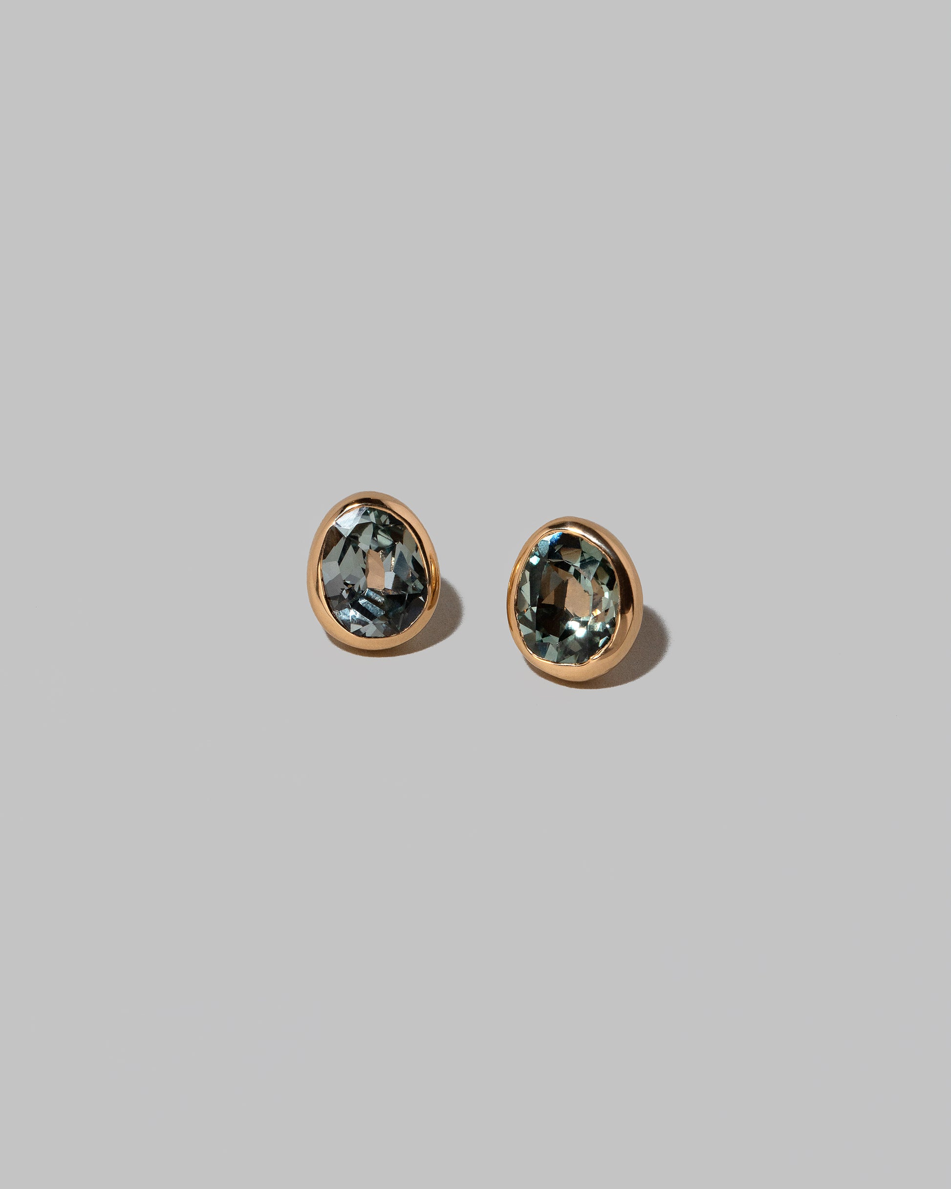 Closeup details of the Juniper Studs on light color background.