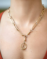 Diamond Luna Ring and Luna Ring Charm paired with the Grand Swivel Fob and Solid Link Necklace on model.