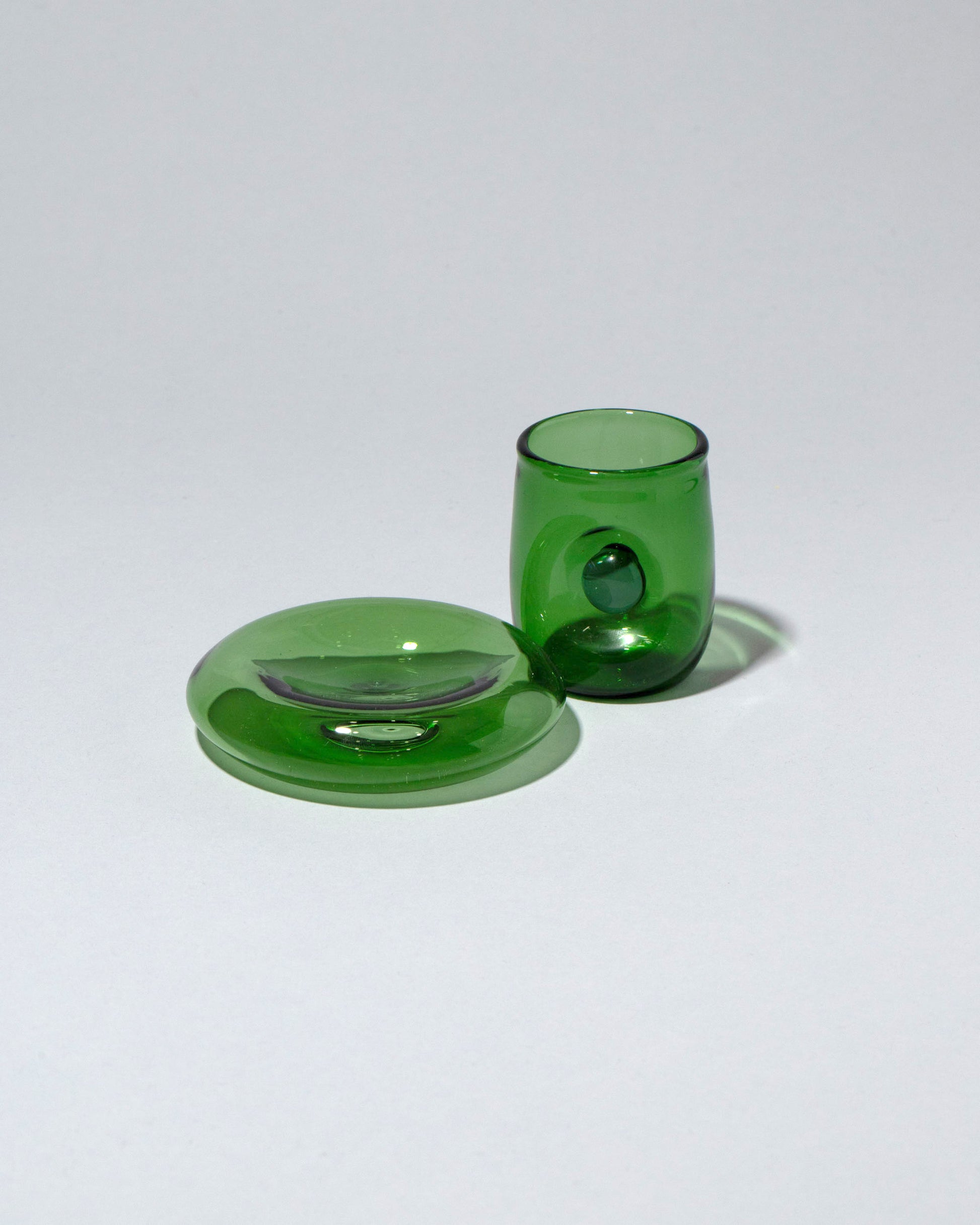 Detail view of the Ornamental by Lameice Green & Lilac Eye Candy Espresso Set on light color background.