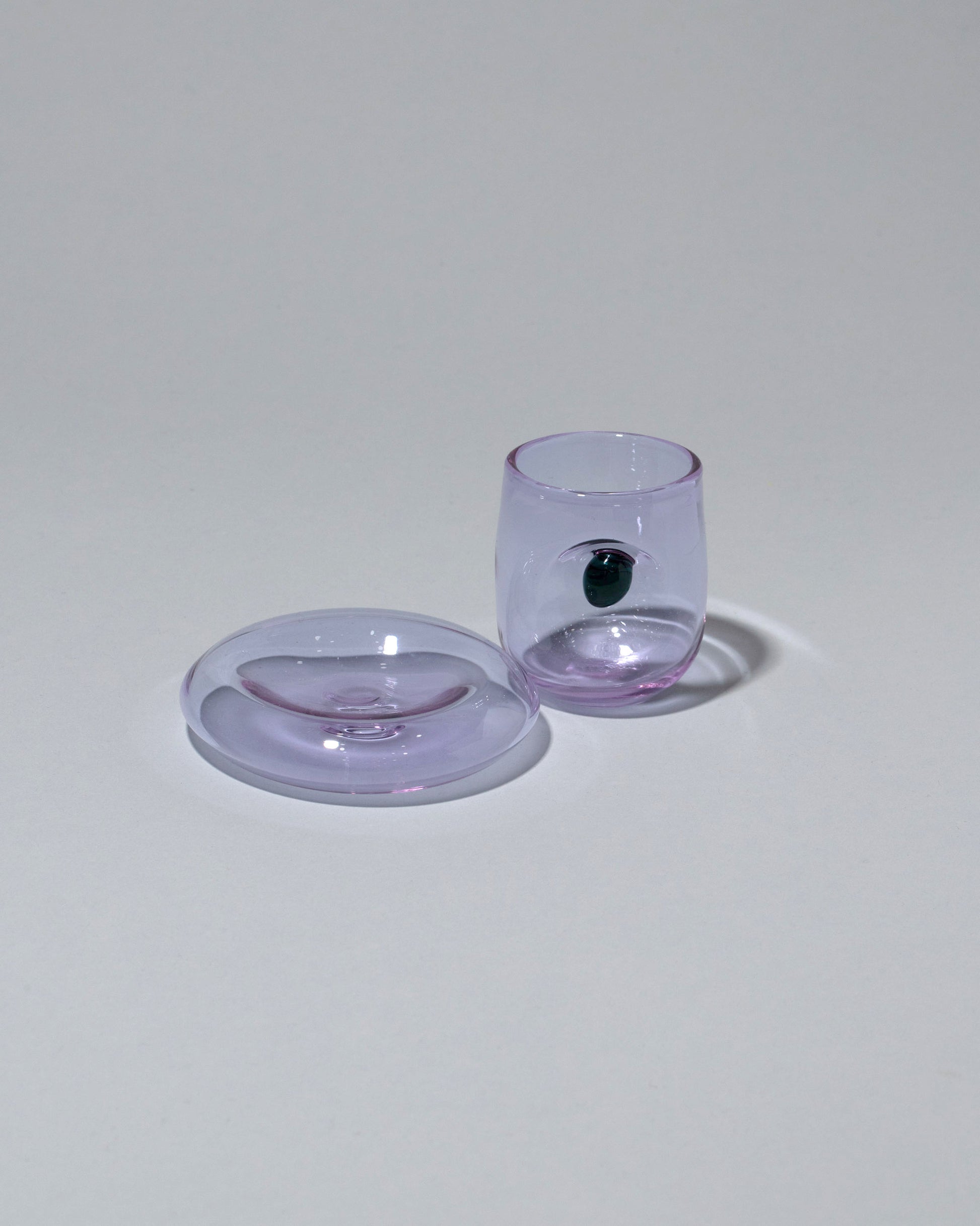 Detail view of the Ornamental by Lameice Lilac & Teal Eye Candy Espresso Set on light color background.