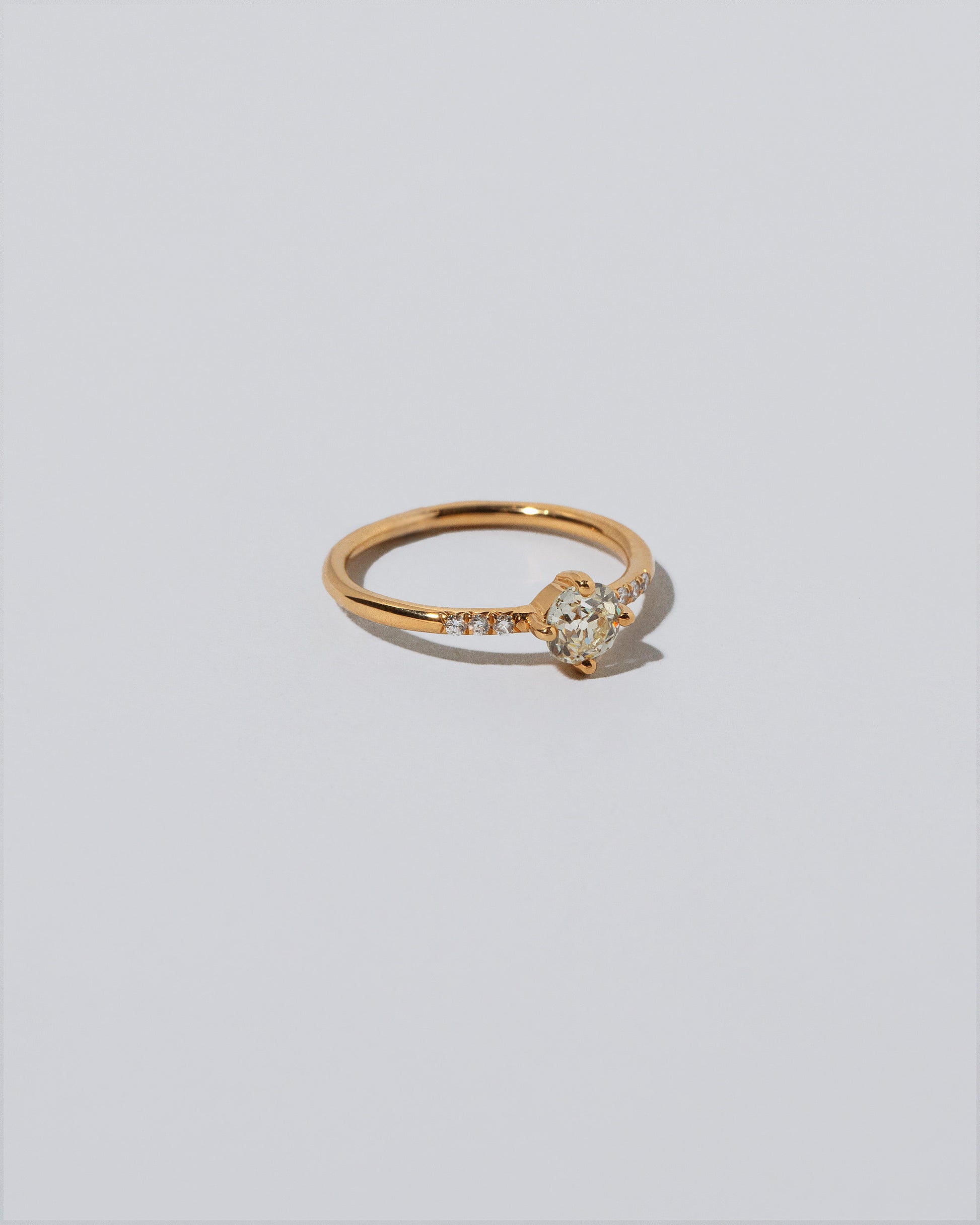 Compass Rose Ring on light color background.
