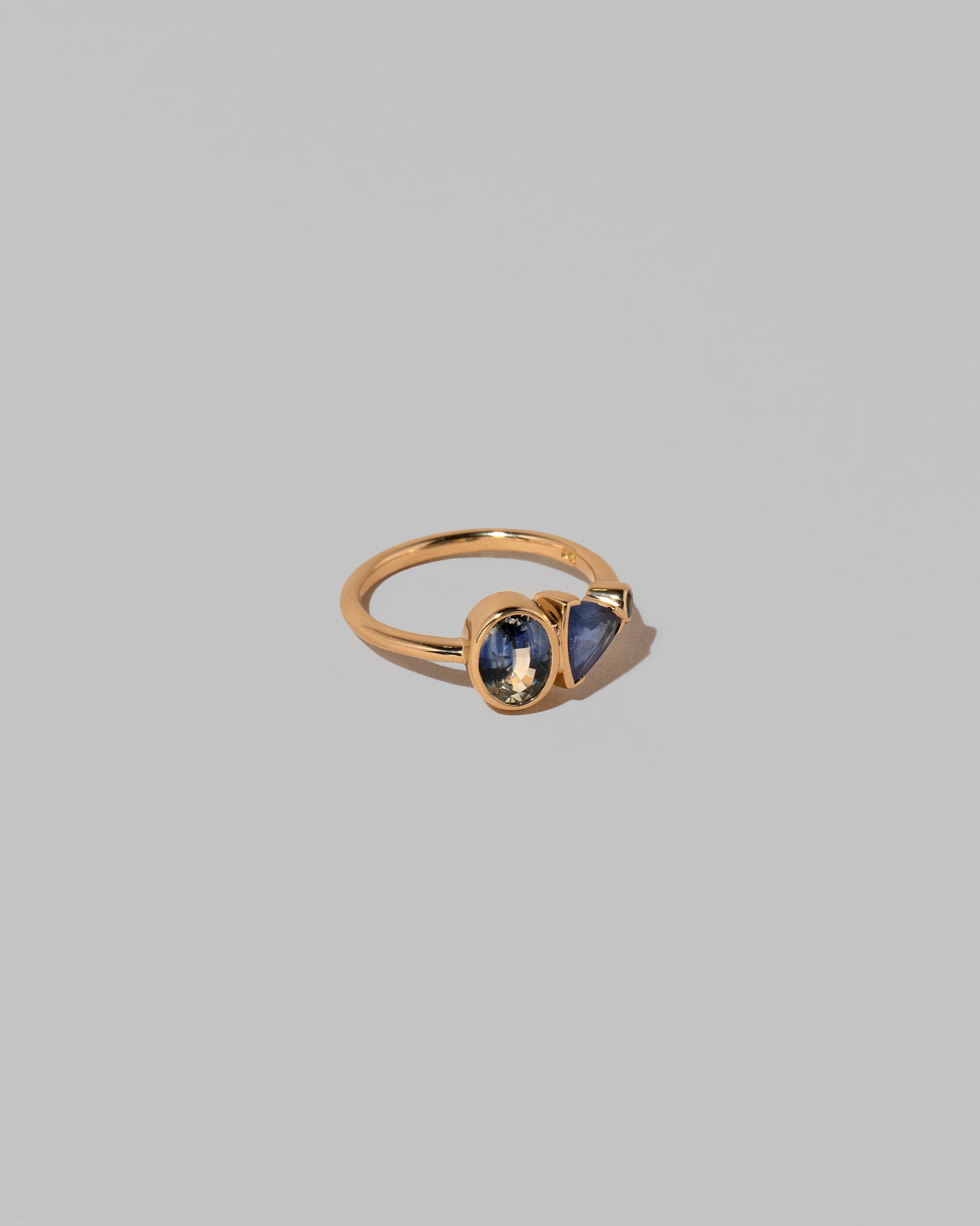 View from the side of the Nemesia Ring on light color background.