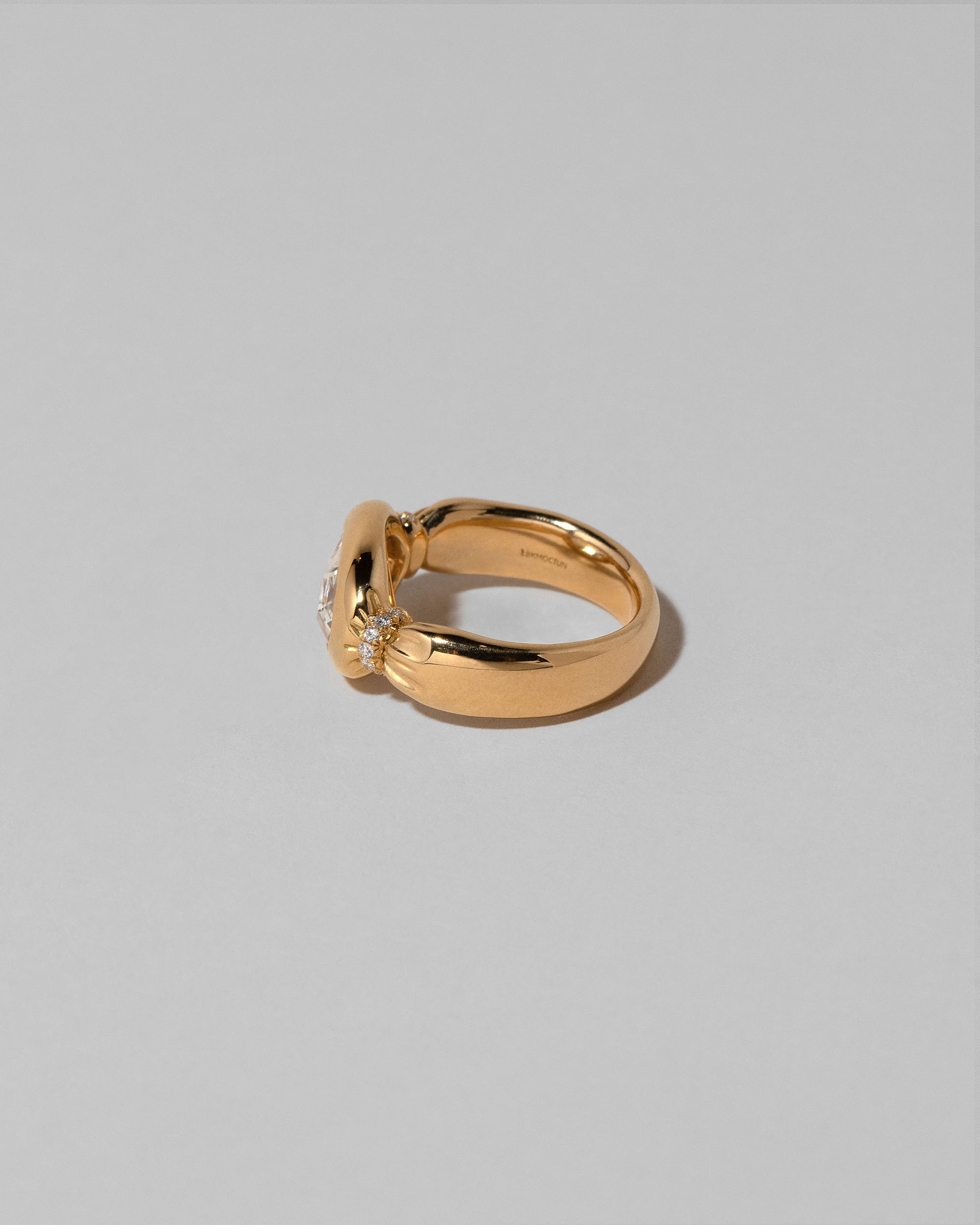 View from the back of the Contort Ring on light color background.