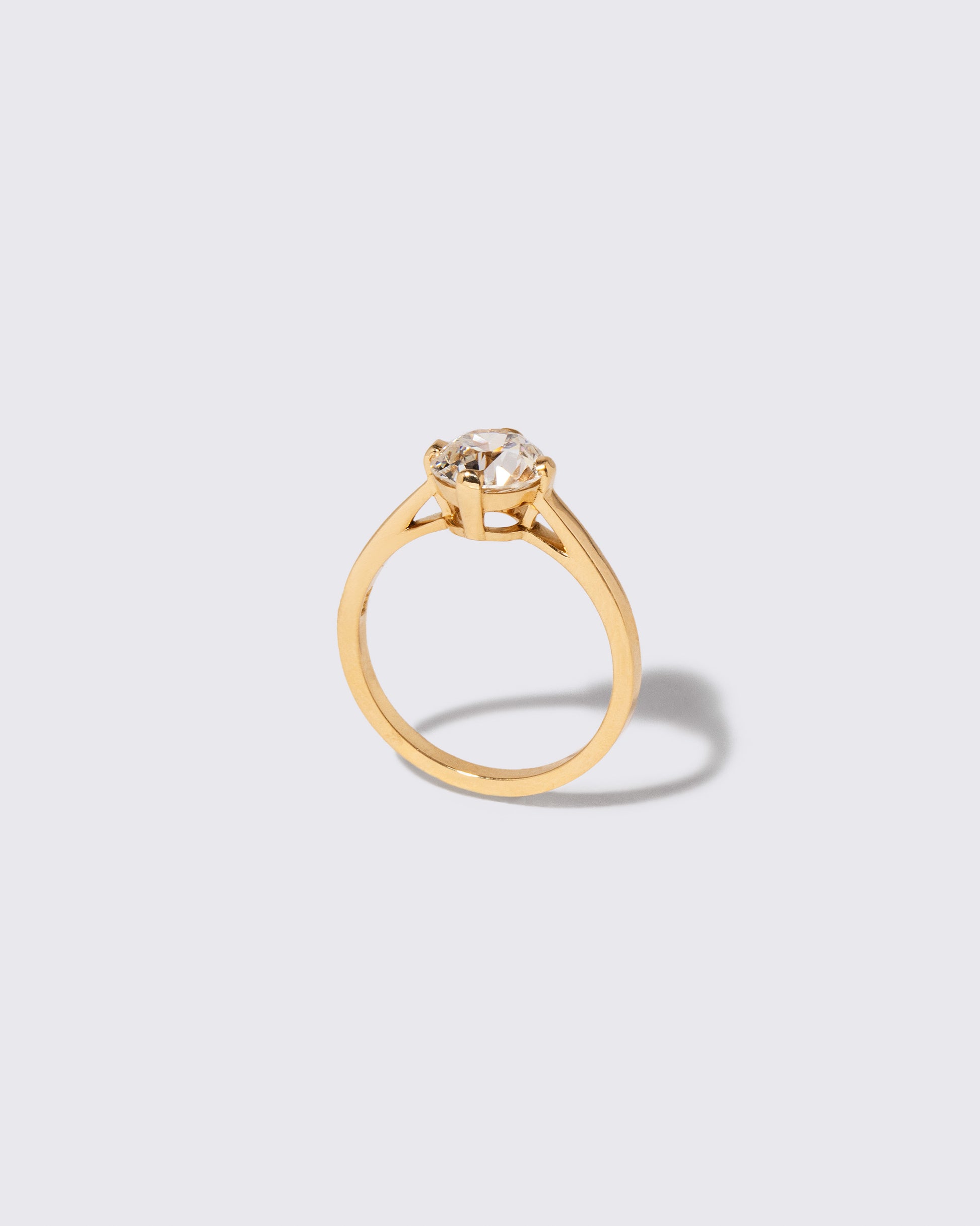 Detail view of the Super White Diamond Barragán Ring on light color background.