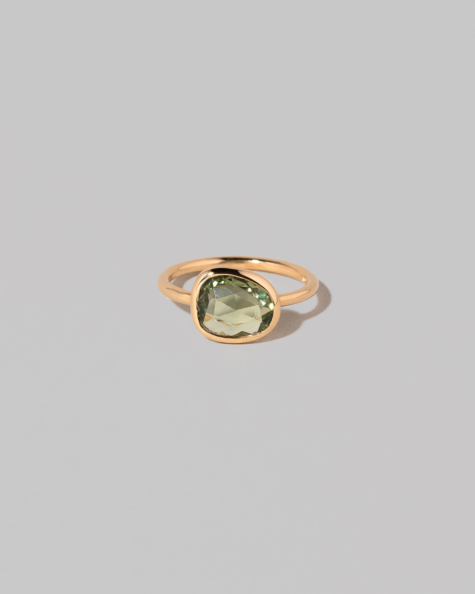 Gusher Green Sapphire Ring 004 on light color background.