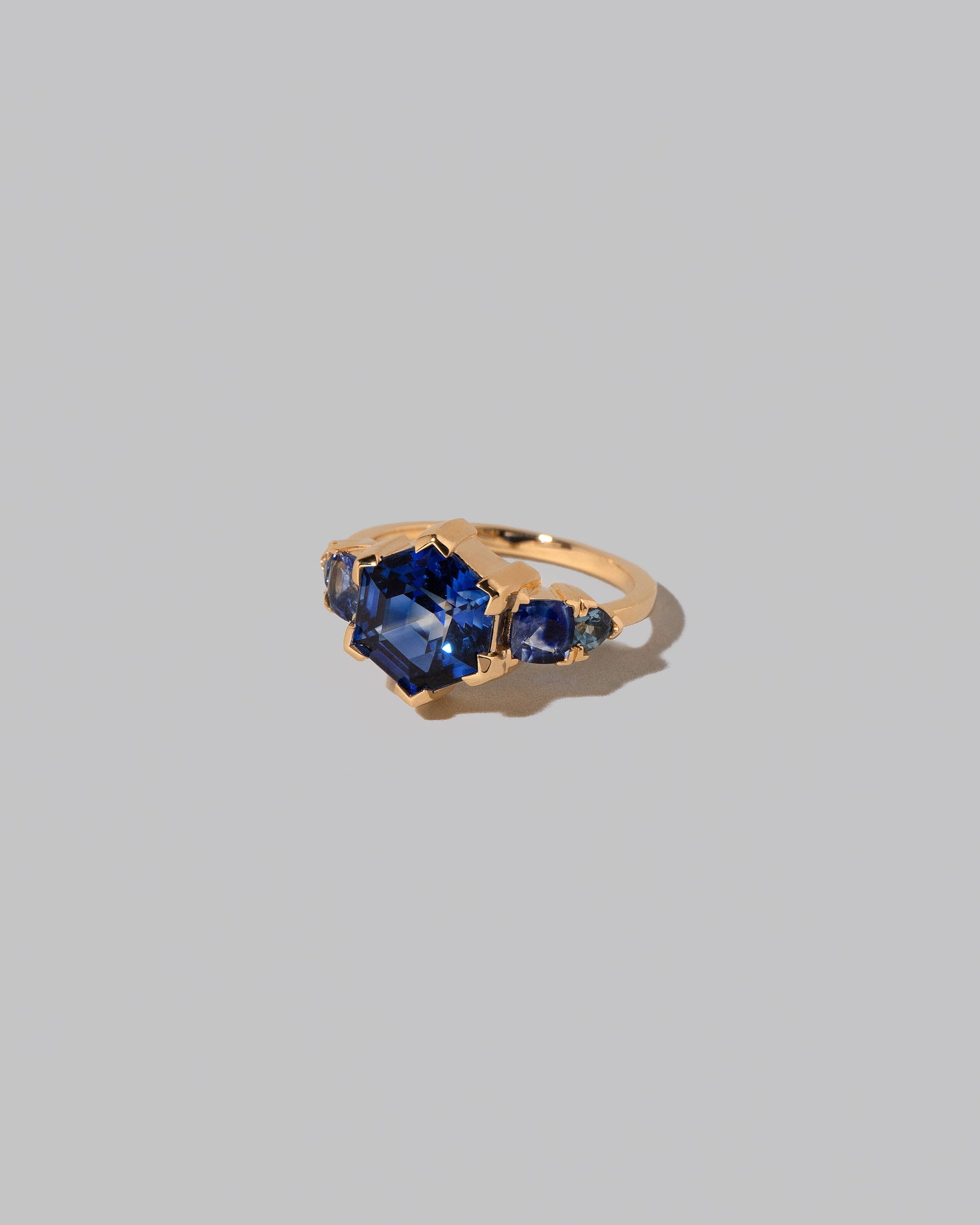 View from the side of the Hyacinthella Ring on light color background.
