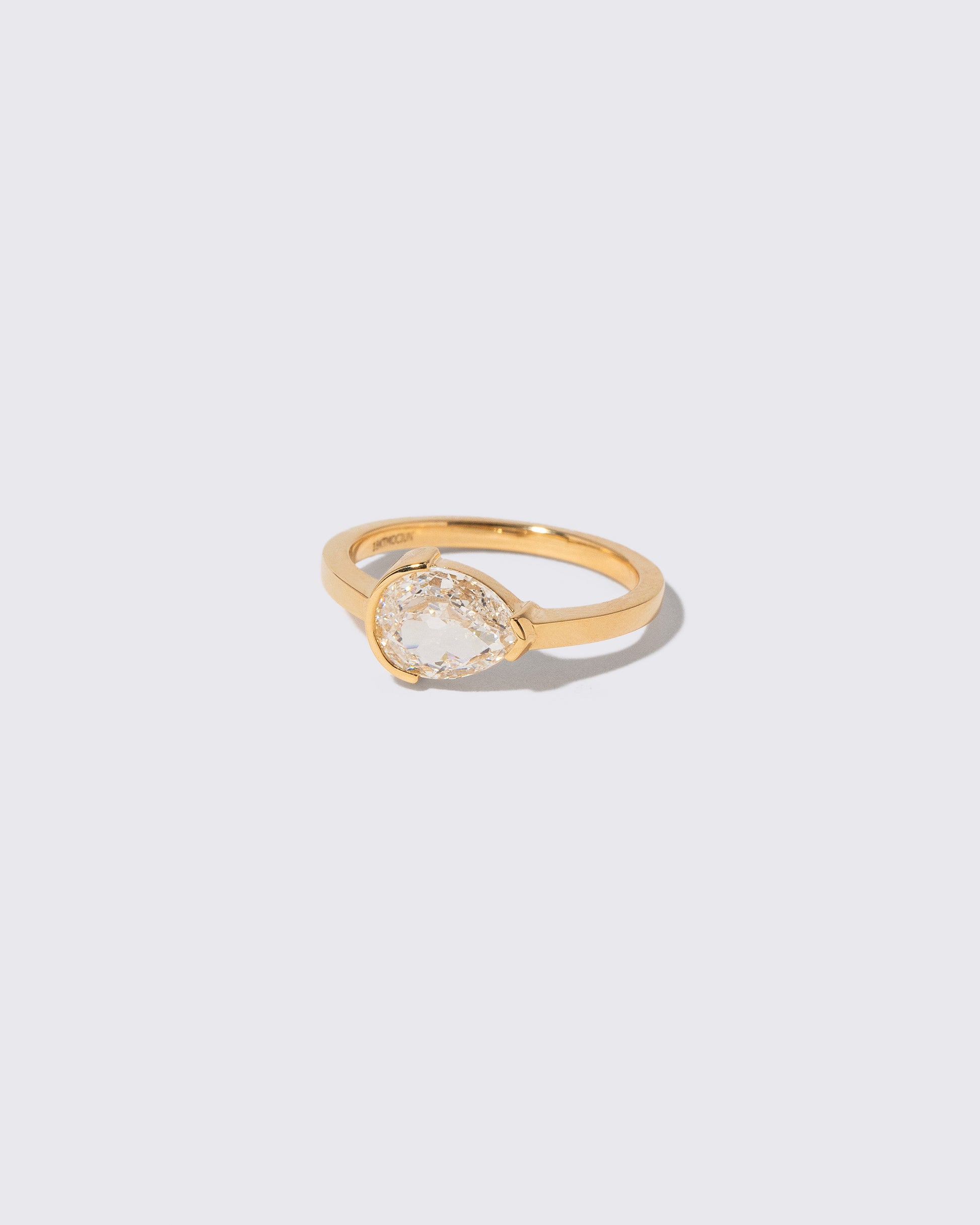 View from the side of the Moonflower Ring on light color background.