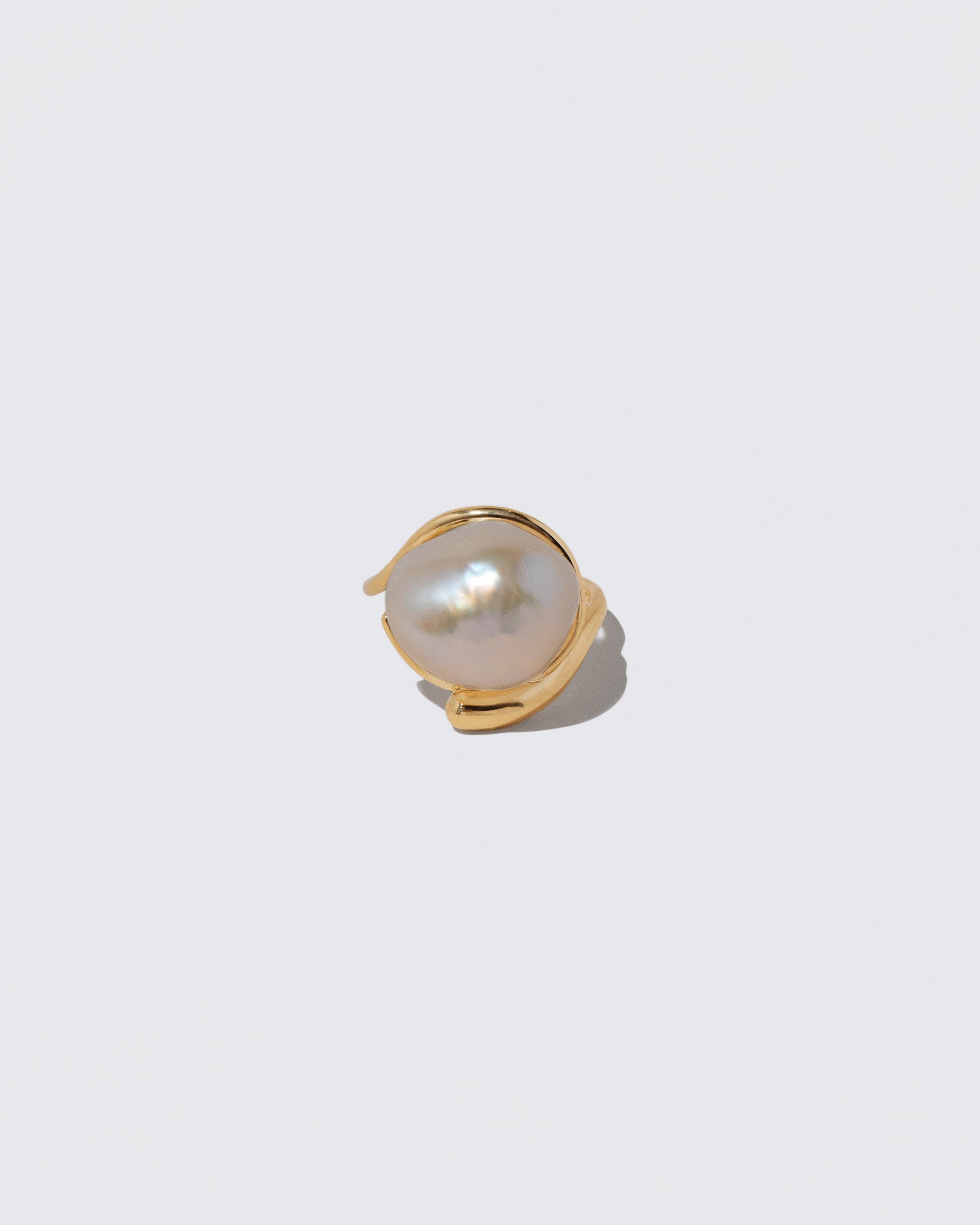 Nereus Ring on light color background.