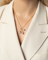 Styled image of model wearing the Wild Poppies Charm.