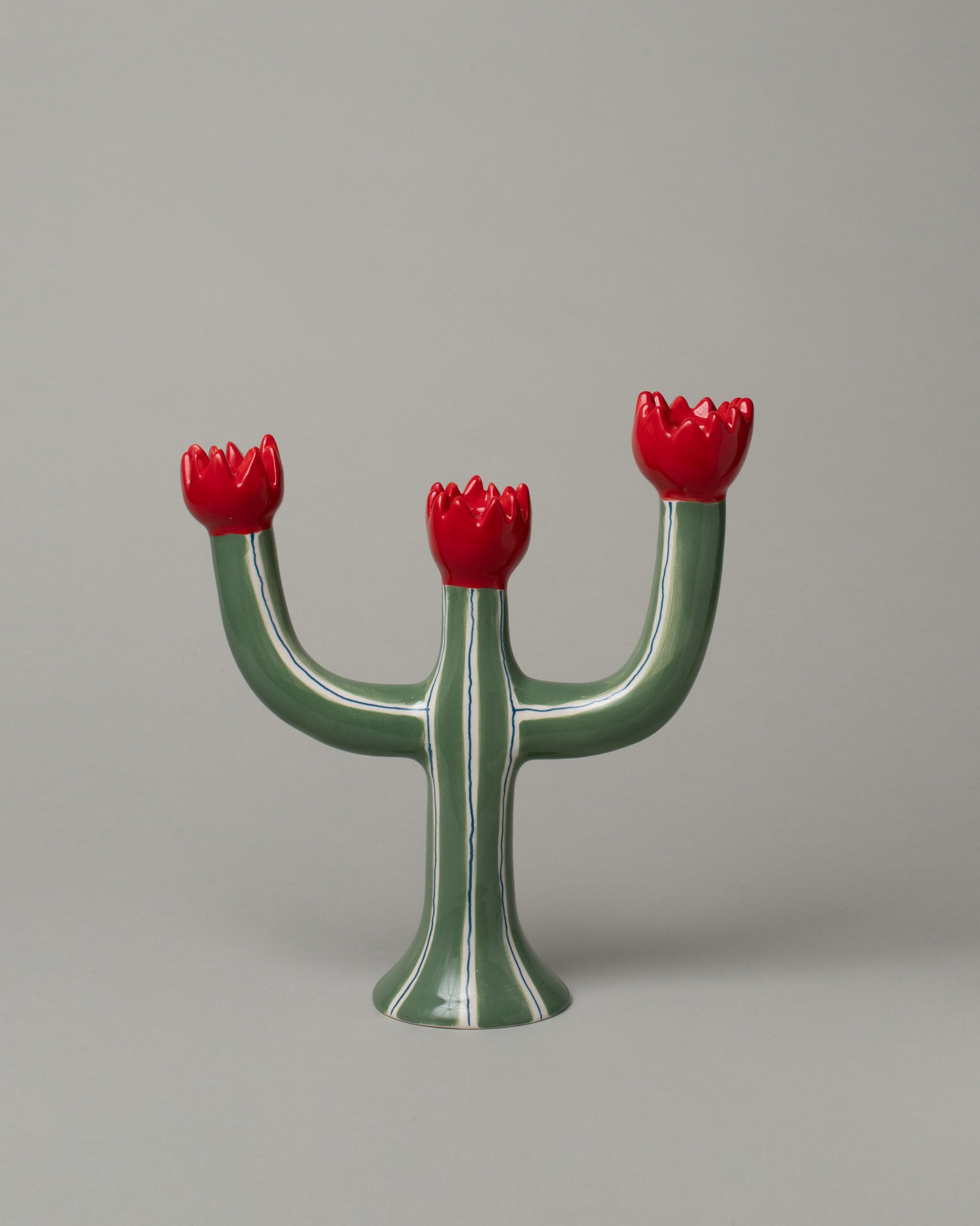 Laetitia Rouget Tulip Candle Holder on light color background.