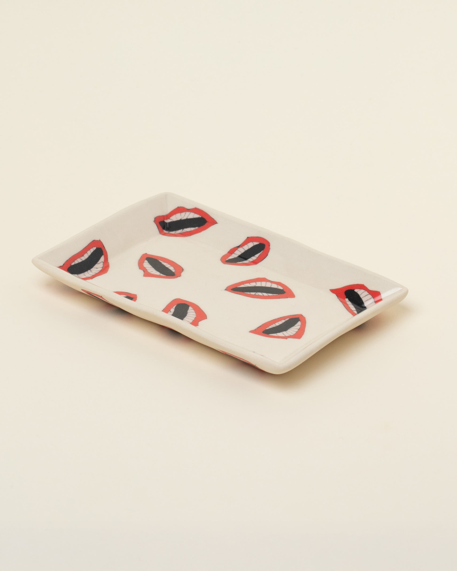 Closeup details of the Slush Club Nerikomi Lip Tray on light color background.