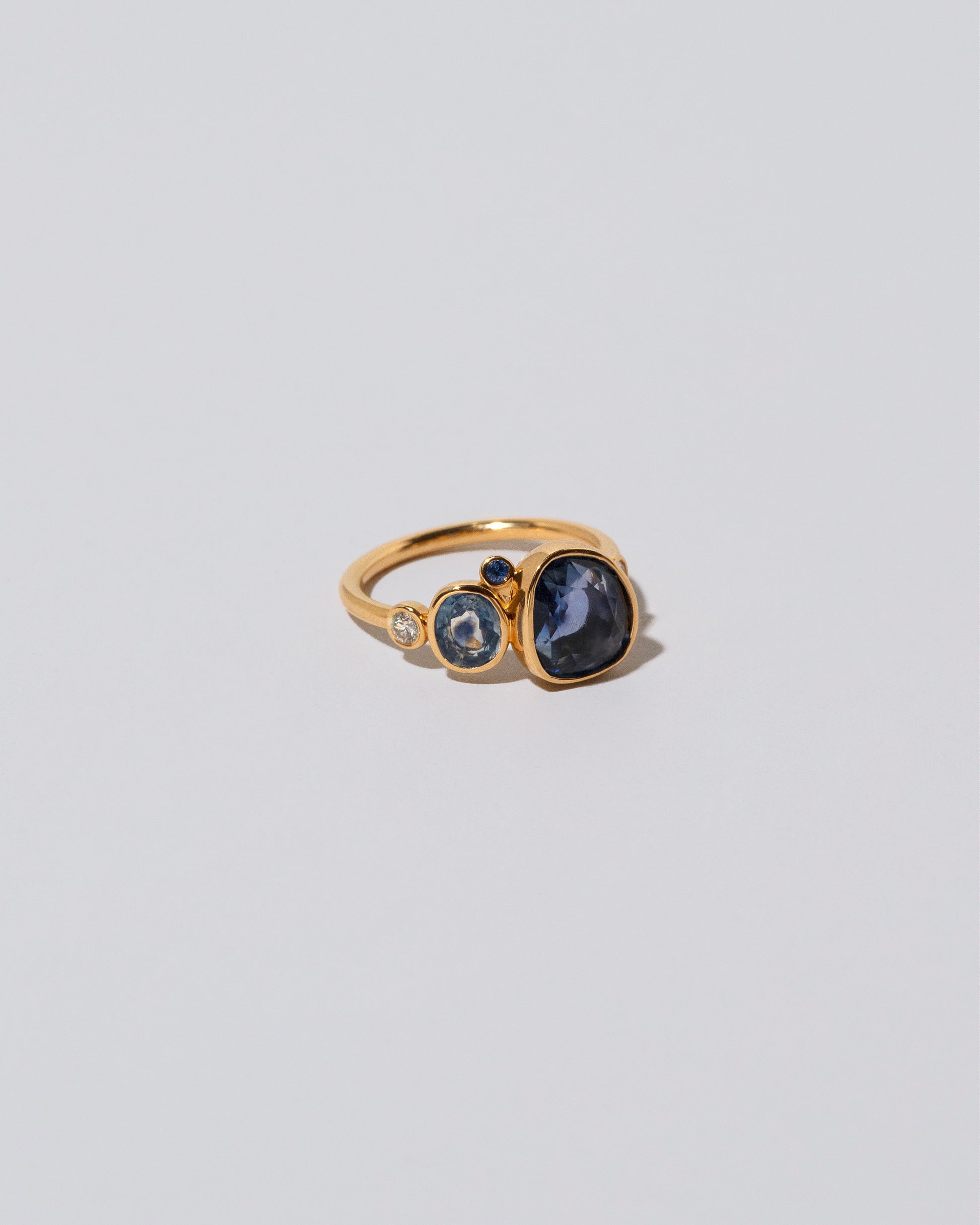 Oceania Ring on light color background.