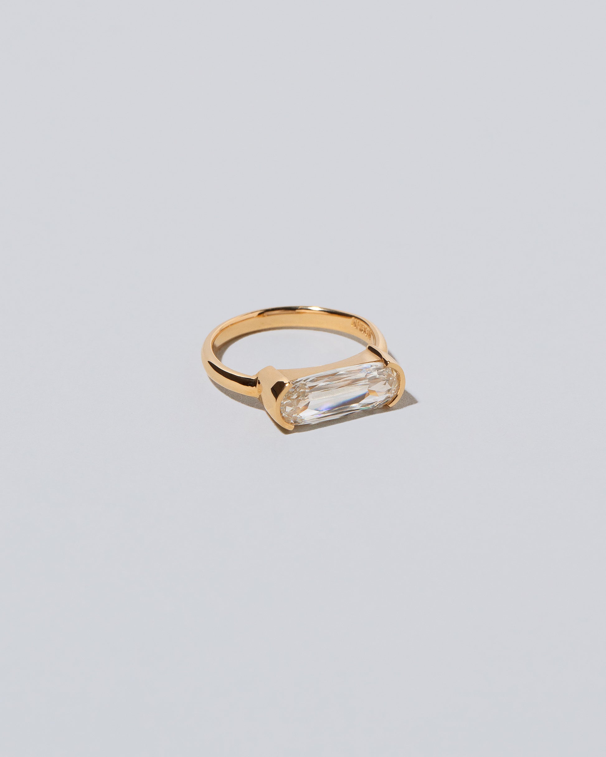 View from the side of the Elara Ring on light color background.