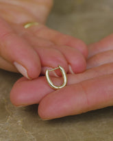 How to style, transform and convert the Styling Huggie Hoops into drop earrings with mixed charms, styling and openable links, including the Infinity Openable Link, Infinite Spiral Styling Link, Infinity Styling Link, Red Apple Core Charm, Butter Chain Styling Link, Cosmic Balance Styling Link, Pavé Styling Link, Pearl Styling Link, standard Styling Link and Gusher Charms.