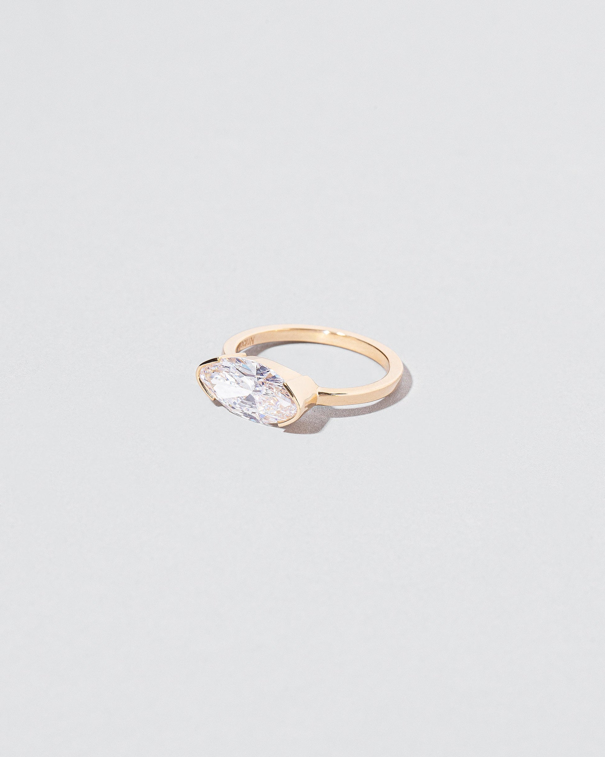 View from the side of the Symmetry Ring on light color background.