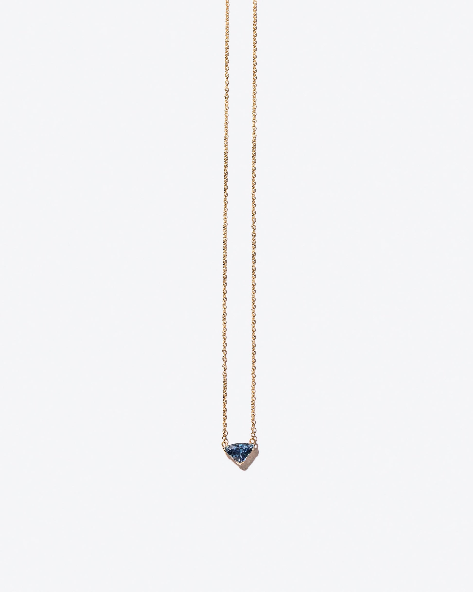 Product photo of Gil Necklace on a light color background 