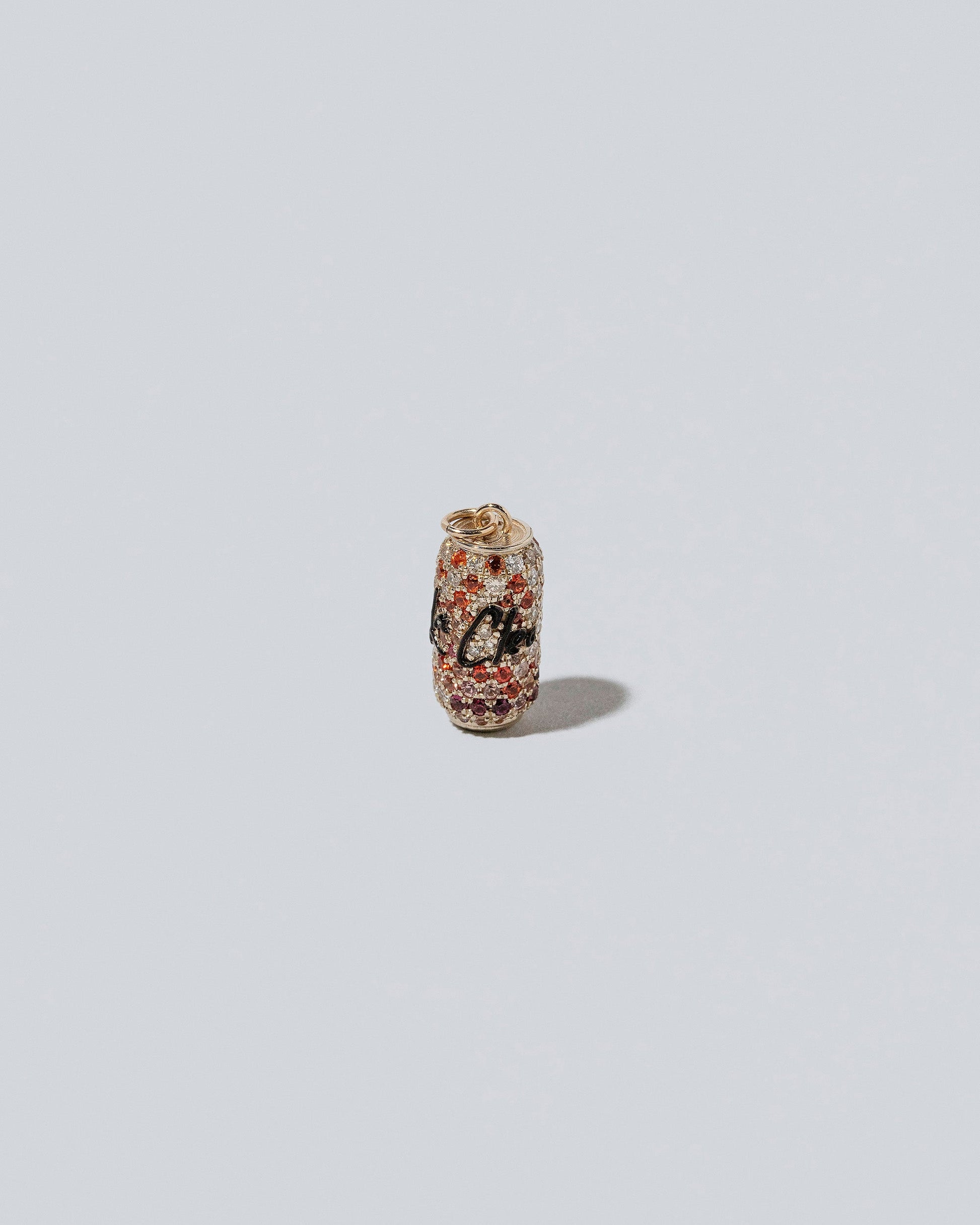 Aluminum Can Charm - La Cleos on light color background.