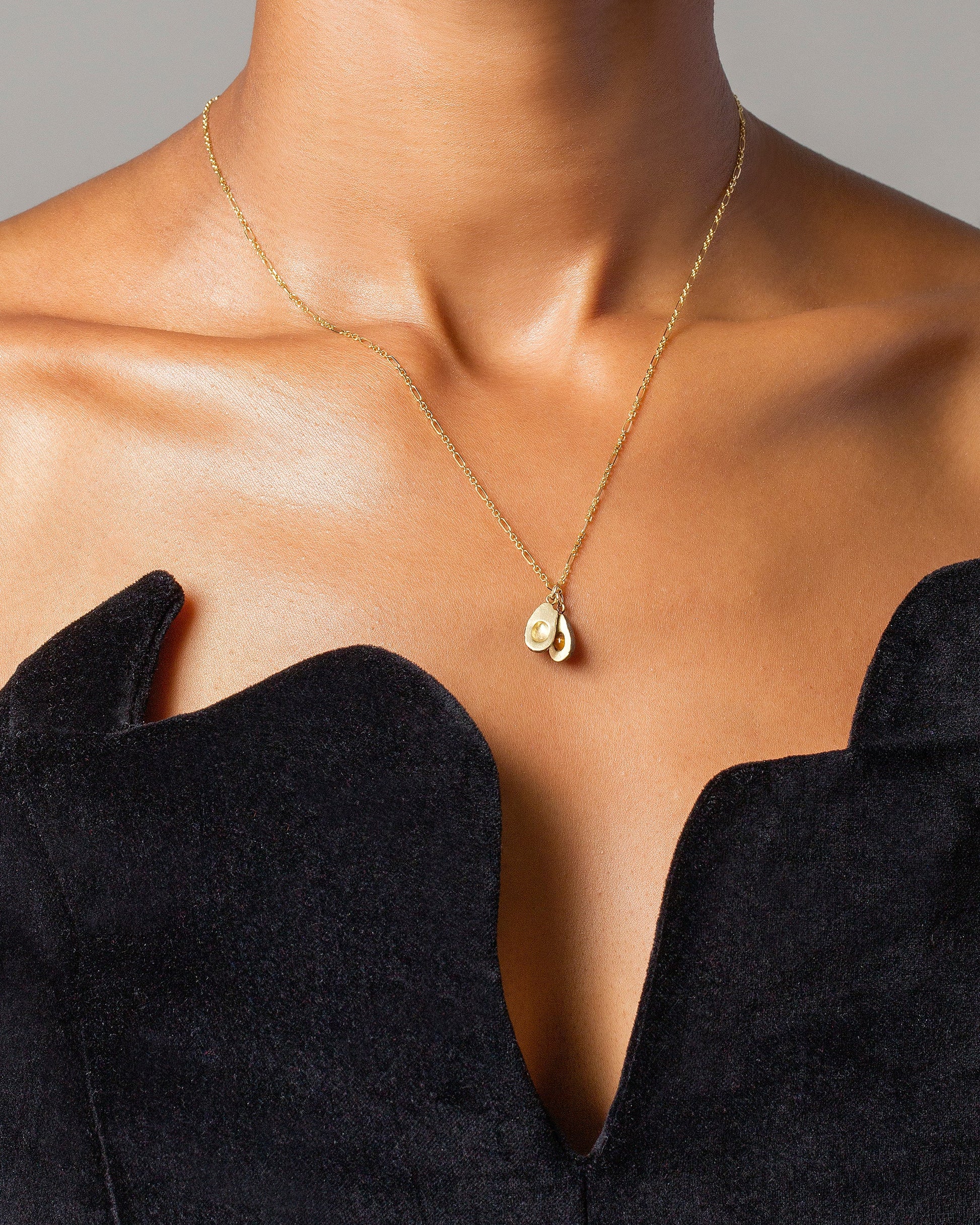 Halved Avocado Charms and Abacus Chain Necklace on model.