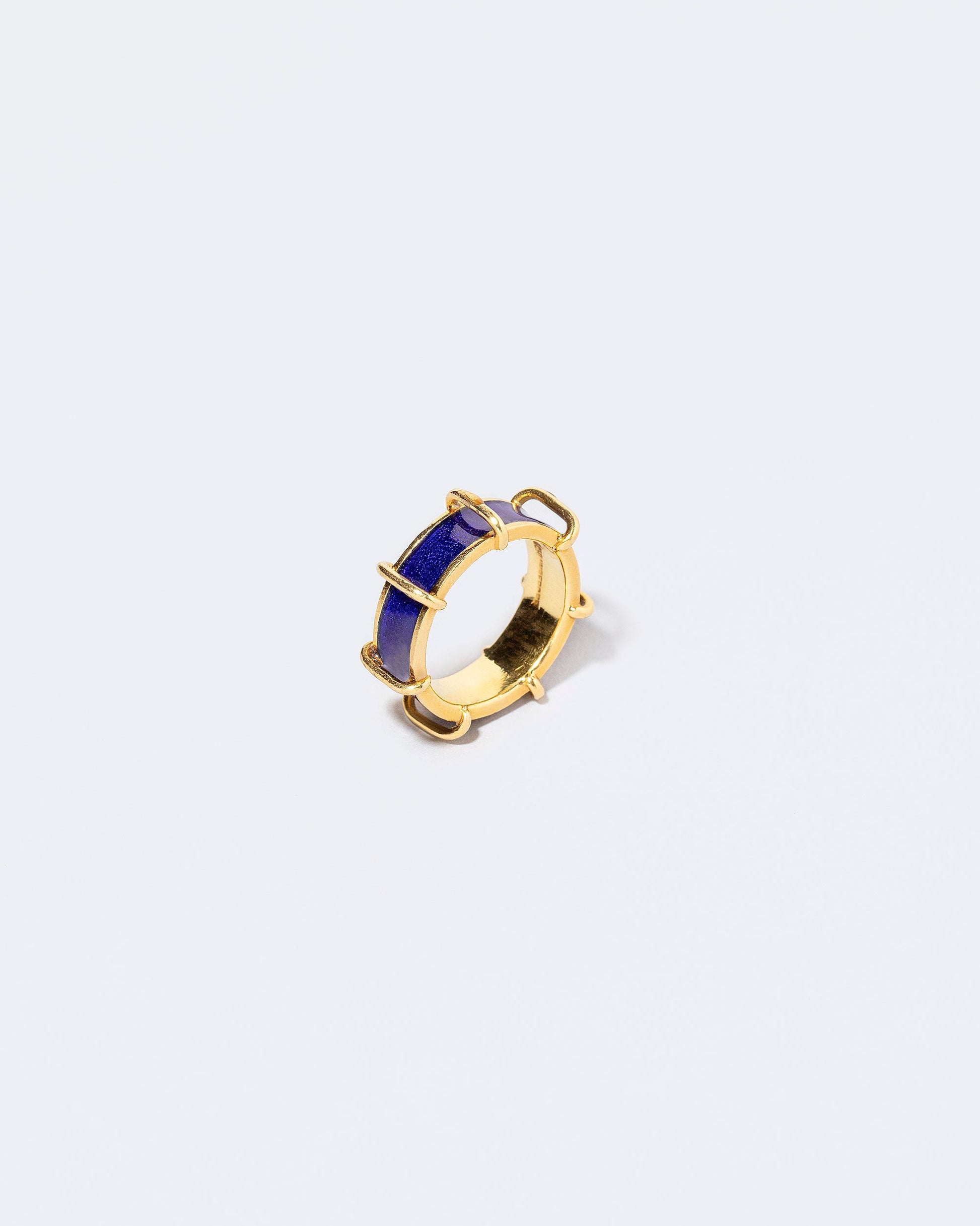 Detail view of the Tiffany & Co. Enamel Band on light color background.