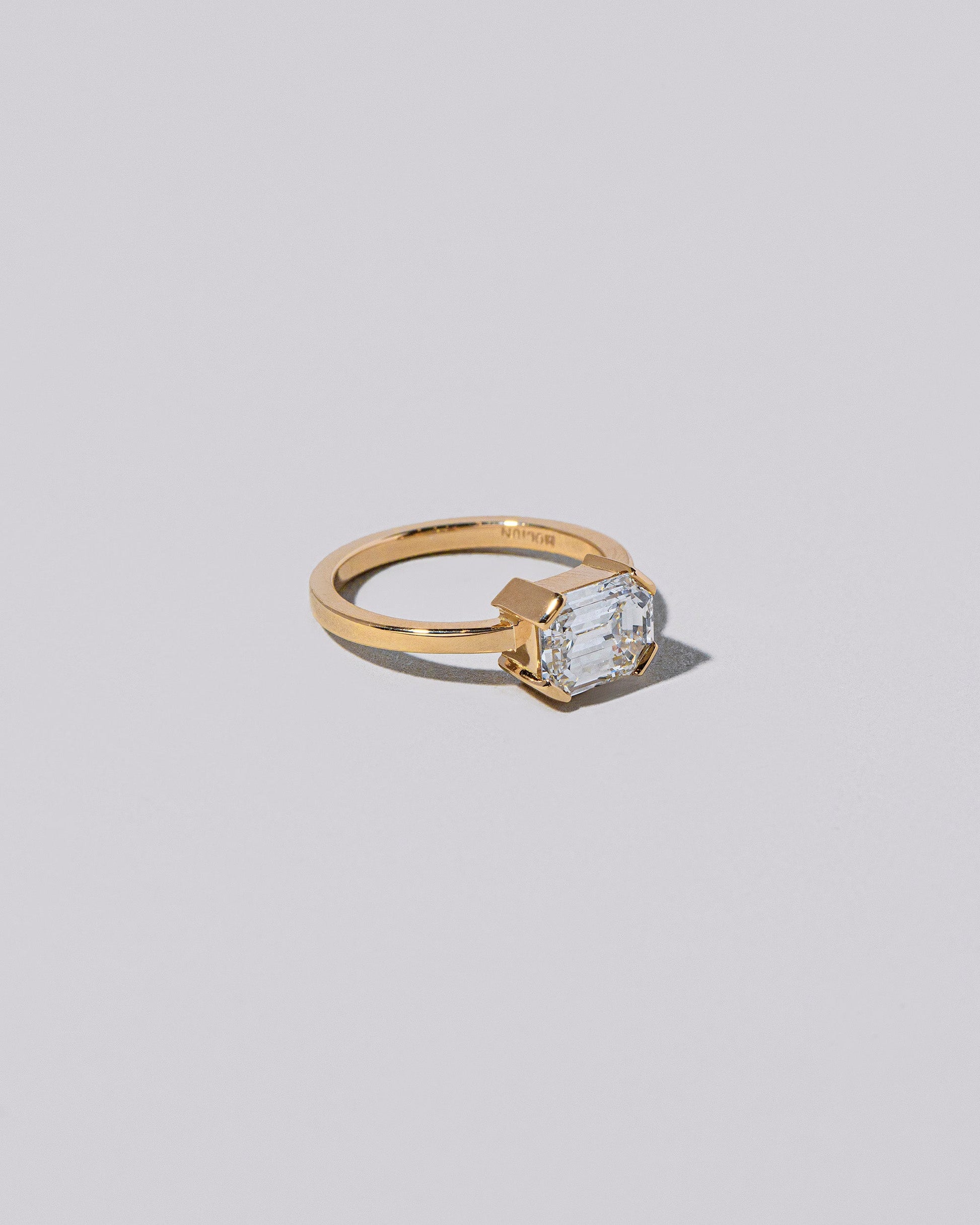 View from the side of the Born Ring on light color background.