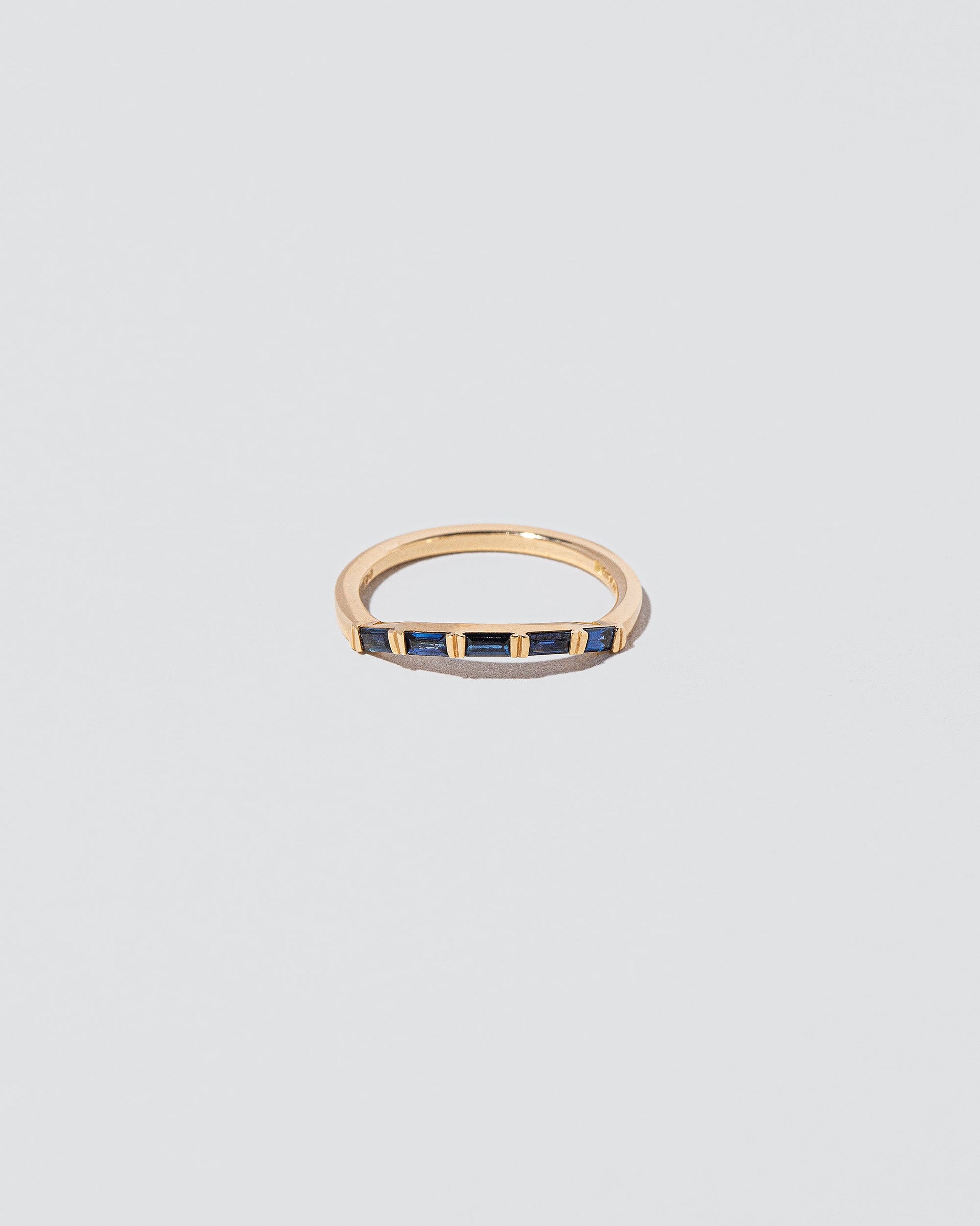 Sapphire Bow Band on light color background.