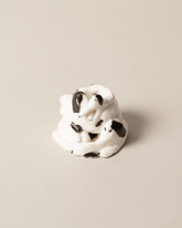 Eleonor Boström Spots Dog Pile on light color background.