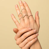 product_details::Gold Pavé Low Peak Bands on model.