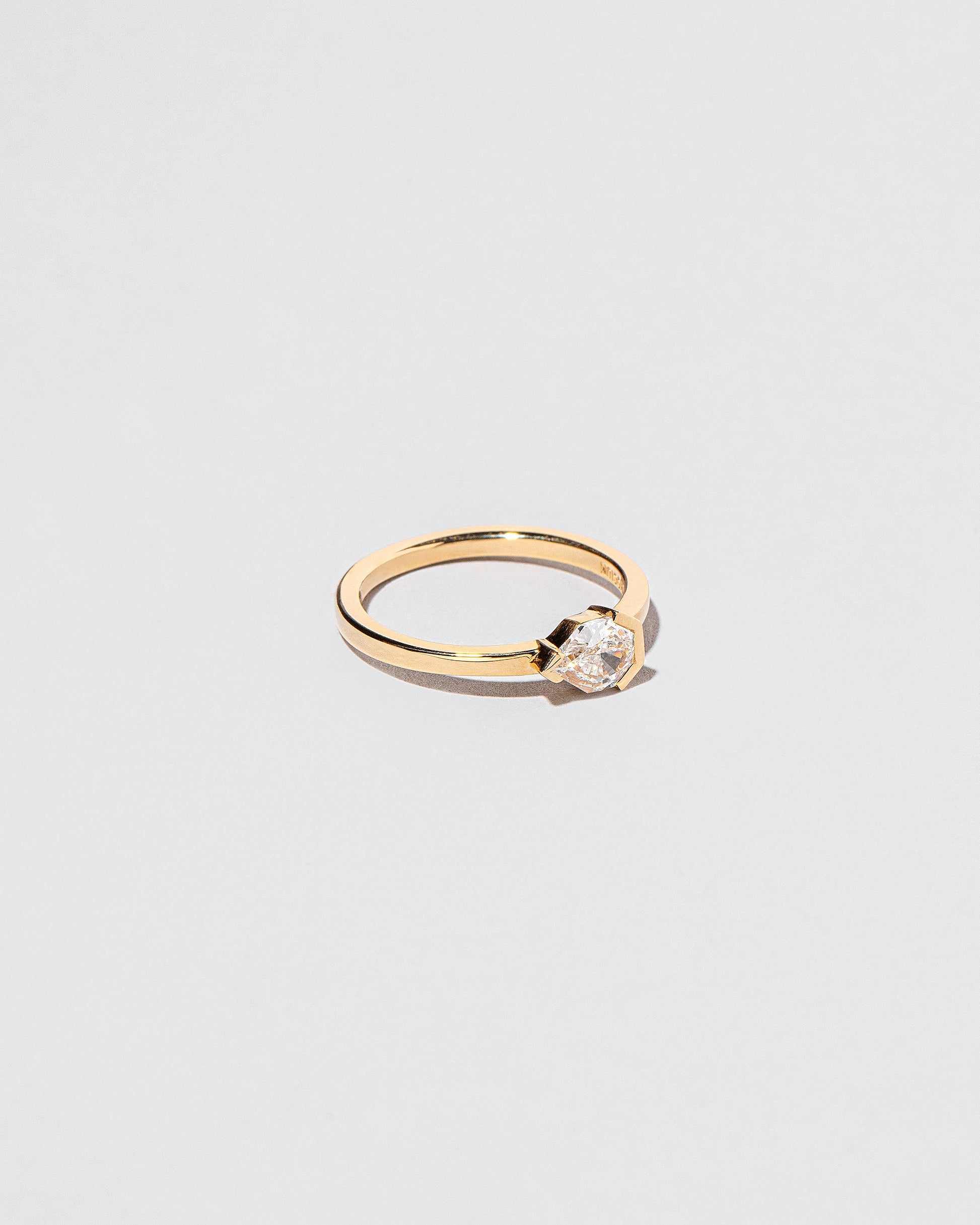 View from the side of the Serenna Ring on light color background.