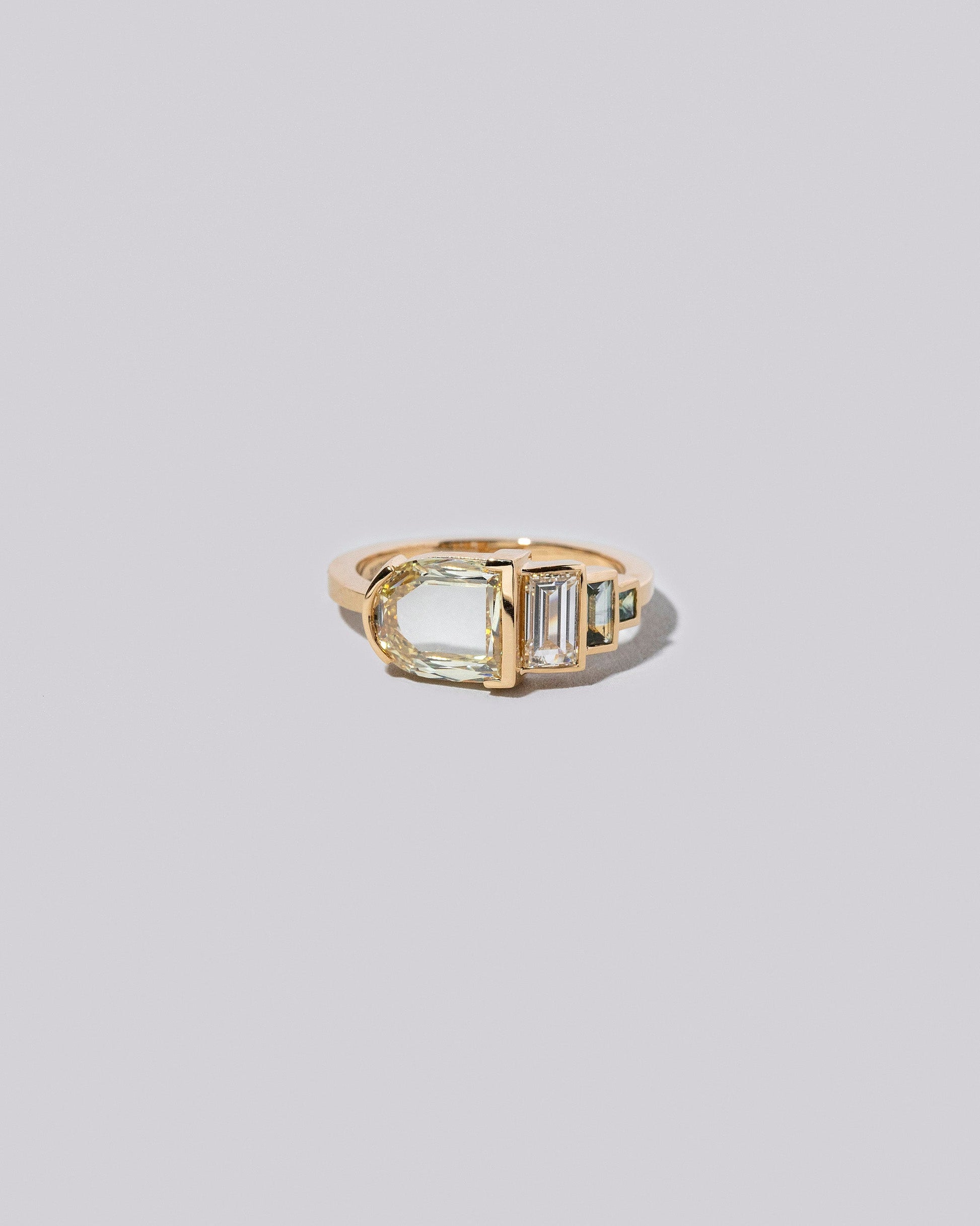 Albertine Ring on light colored background.