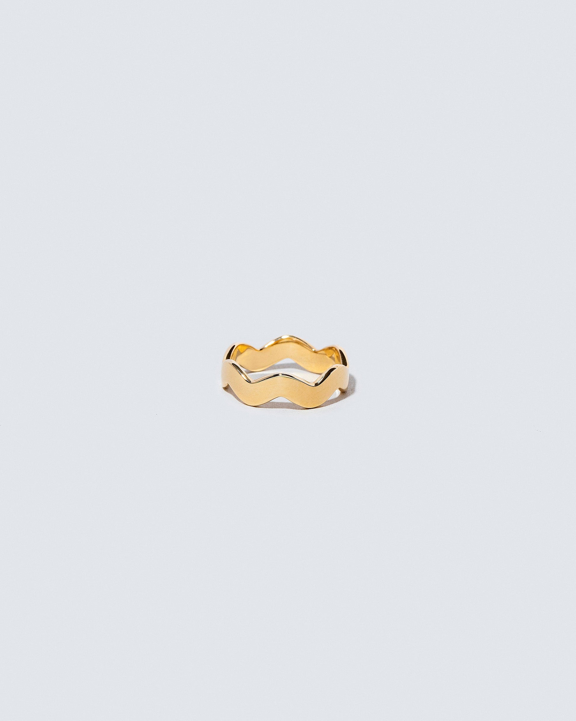 Gold 4mm Ripple Band on light color background.